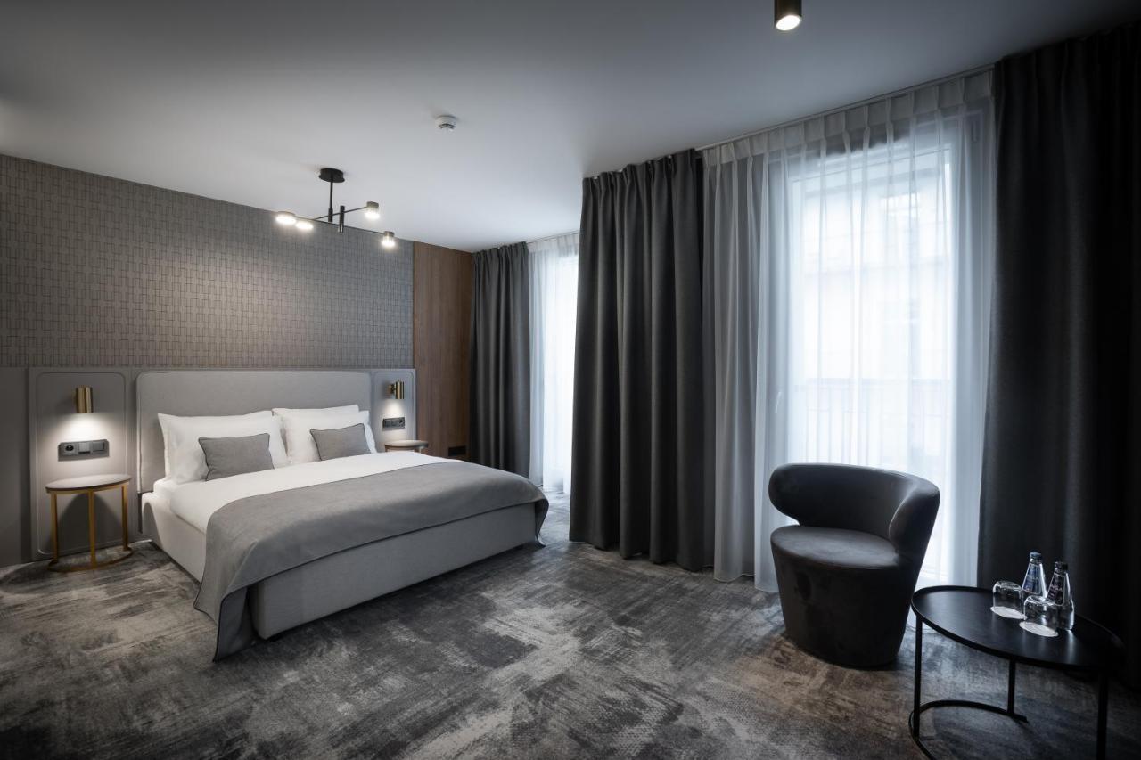 Aparthotel Art Boutique à Cracovie Extérieur photo A bedroom at the hotel