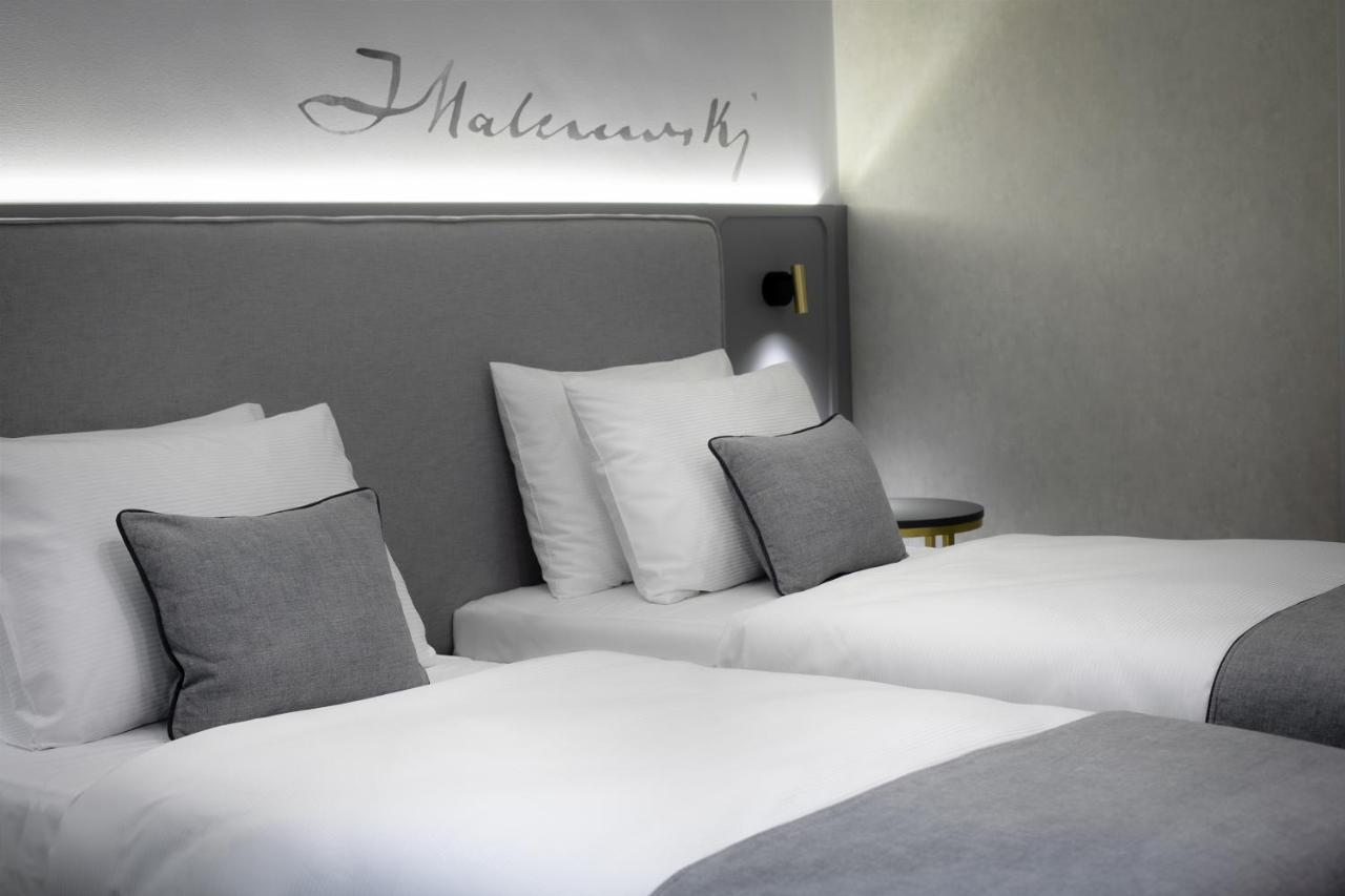Aparthotel Art Boutique à Cracovie Extérieur photo A bedroom at Malmaison
