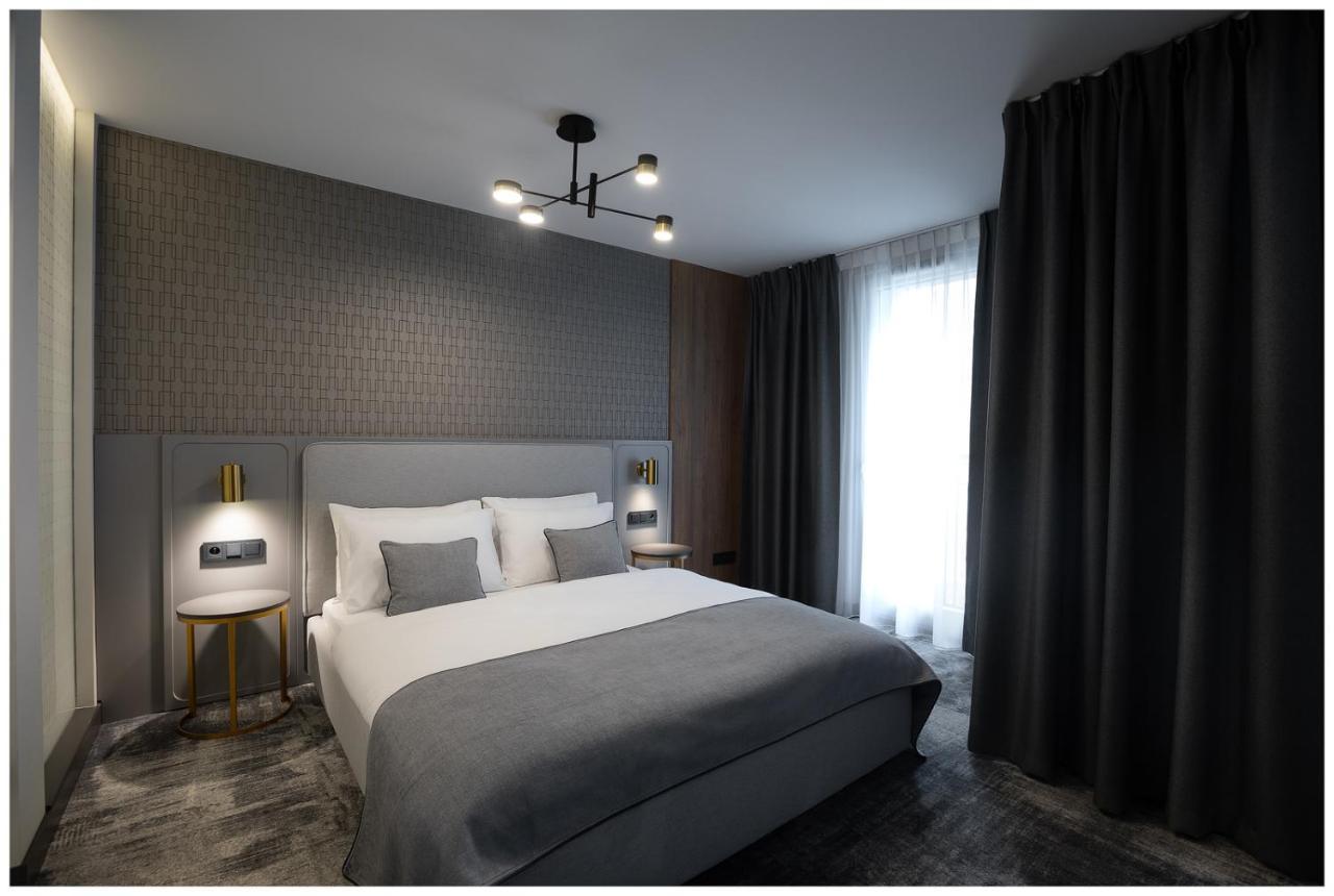 Aparthotel Art Boutique à Cracovie Extérieur photo A bedroom at the hotel